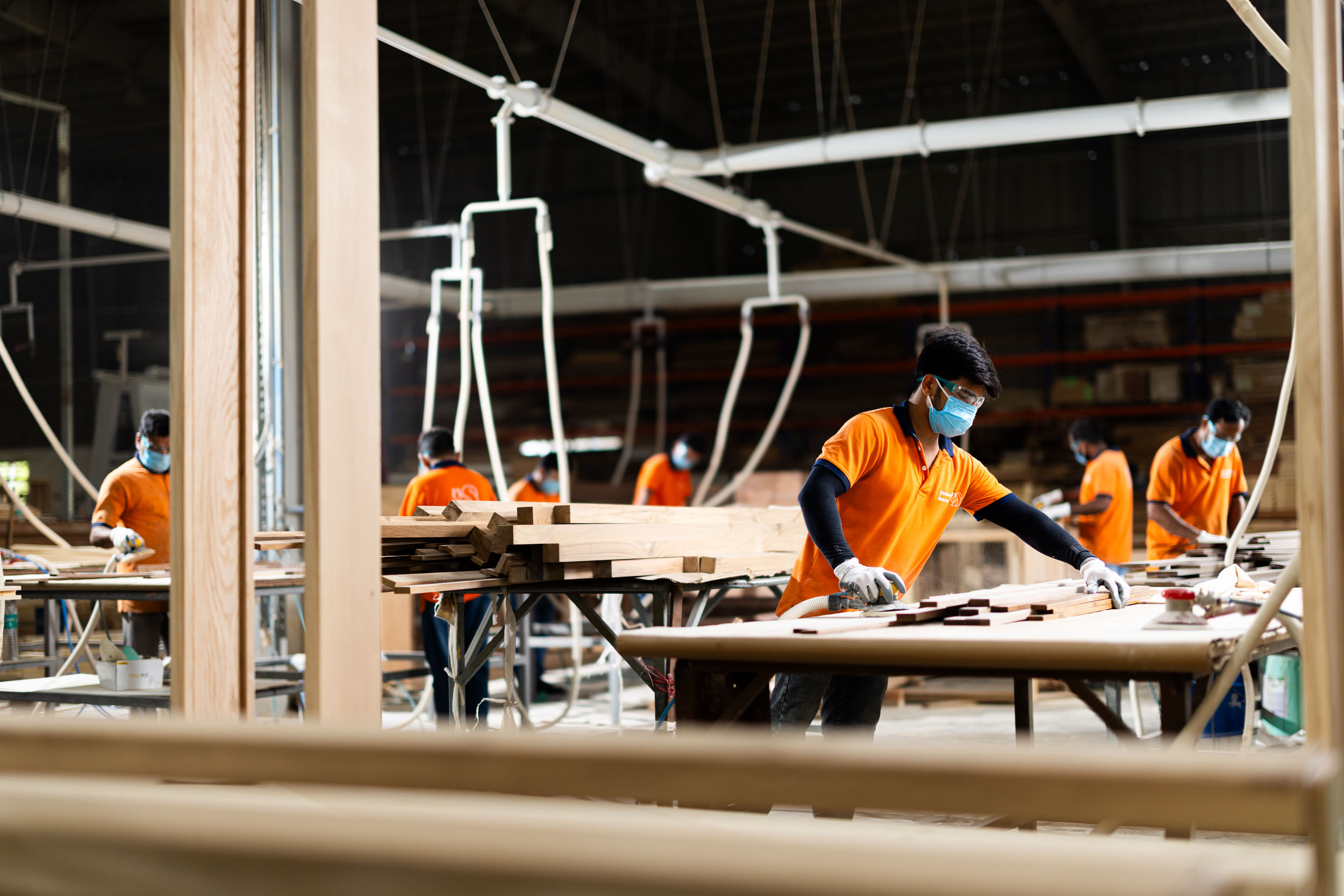 Artisans at work in the Total Environment Machine Craft facility