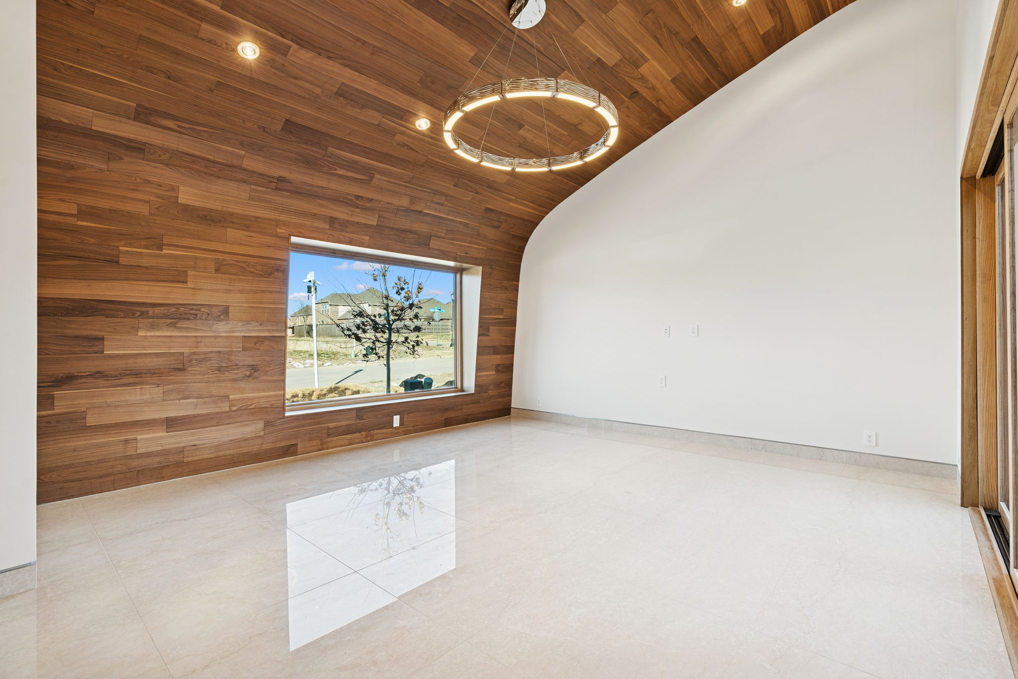 14867 Little Bluestem Ln - living room with wood accent wall