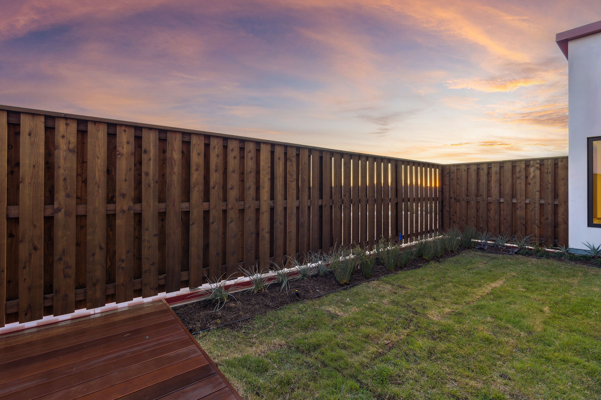 14867 Little Bluestem Ln - private garden with deck at sunset