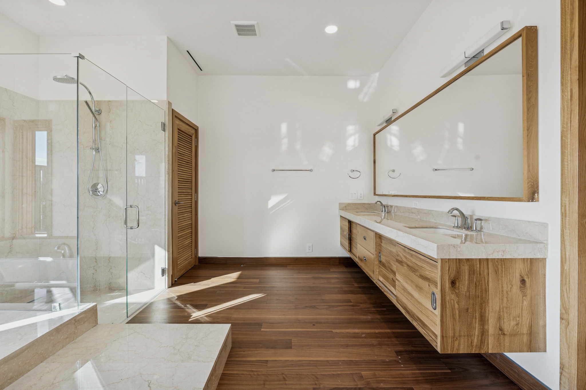 14867 Little Bluestem Ln - primary bathroom with marble and oak vanity